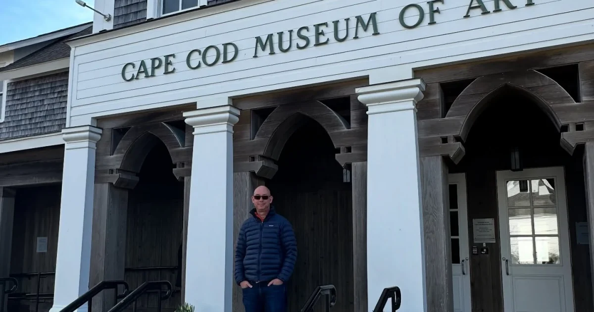 Colin Goldberg standing at the entrance to Cape Cod Museum of Art
